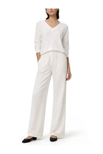 Herno women’s maglia white v-neck long-sleeved knit top with matching wide-leg knit trousers in glam knit effect