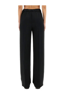 Herno women’s black high-waisted wide-leg trousers with soft elastic waistband perfect for resort wear