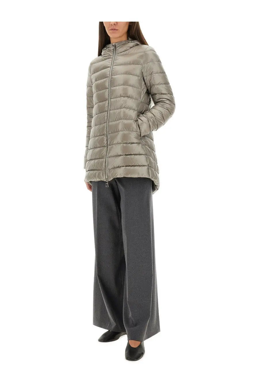 A sleek quilted olive green puffer jacket with hood and front zipper paired with herno women’s pants resort grey