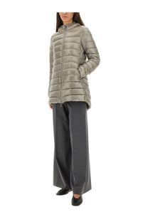 A sleek quilted olive green puffer jacket with hood and front zipper paired with herno women’s pants resort grey