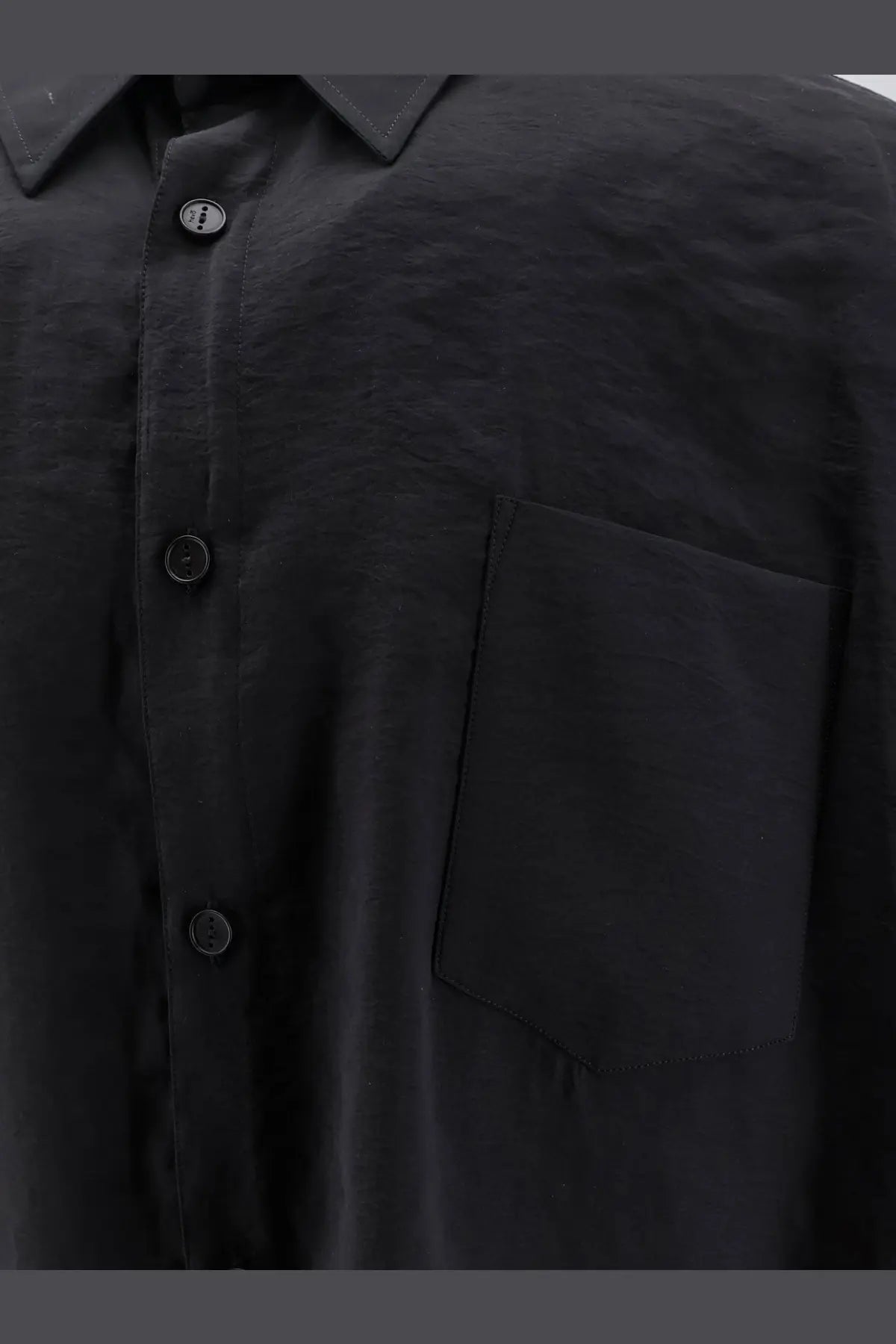 Hevò men’s Arpinova modal blend black button-up shirt with subtle texture and matching dark buttons