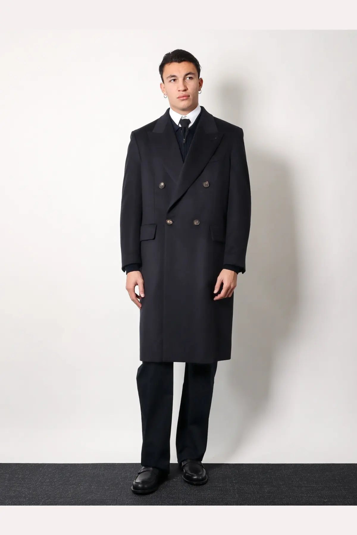 Black double-breasted wool overcoat with silver-toned buttons by hevò men’s cashmere coat blue