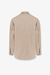 Beige long-sleeved button-up shirt with classic collar and subtle stitching details with cotton and linen blend