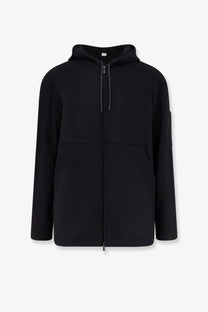 Hevò men’s grottaverde black zip-up hoodie with sleek minimalist design and subtle gray drawstrings in virgin wool blend