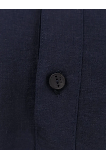 Dark gray textured button on navy blue fabric of hevò mens montursi linen and viscose shirt blue