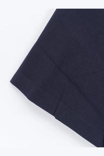Hevò men’s mulino cotton shirt in blue showing dark navy blue fabric with matching hem stitching detail