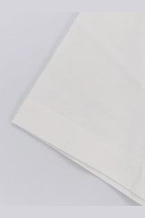 A crisp white cotton pillowcase with a neatly folded edge and subtle texture in hevò mens mulino cotton shirt white packaging