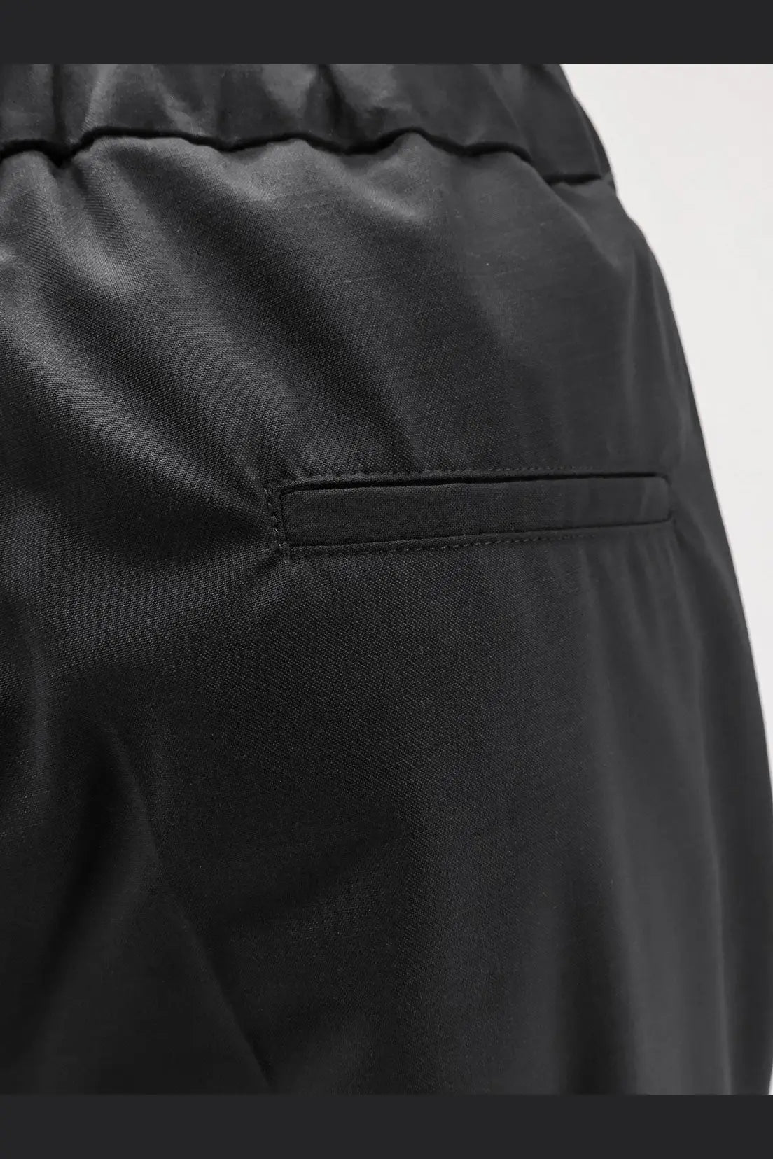 Hevò men’s torre chianca black satin-like linen and viscose trousers with subtle sheen and stitched pocket detail