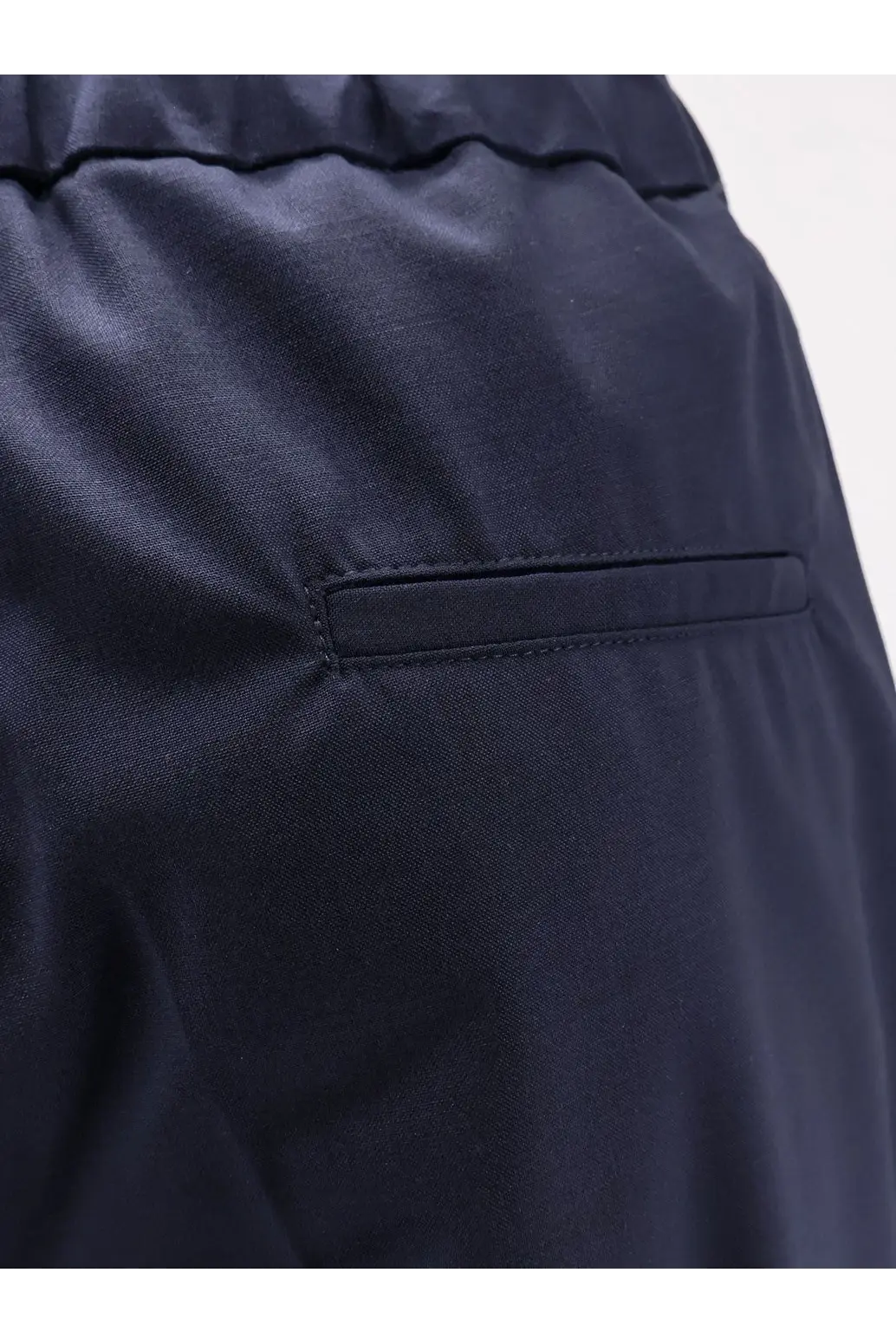 Hevò men’s torre chianca wool blend trousers in dark navy blue with smooth texture and stitched front pocket detail