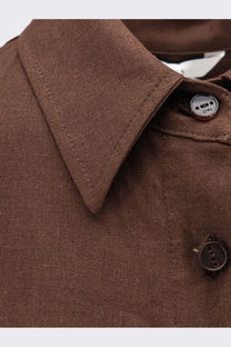 Brown linen shirt with classic collar and dark brown buttons from hevò women’s arigliano chemisier dress