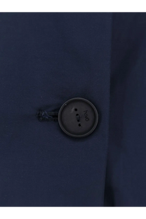 Dark gray hvo button on navy blue cotton blend fabric of hevò womens cala paradiso raincoat