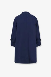 Hevò women’s cala paradiso navy blue cotton blend raincoat with buttoned cuffs and central seam shown from the back