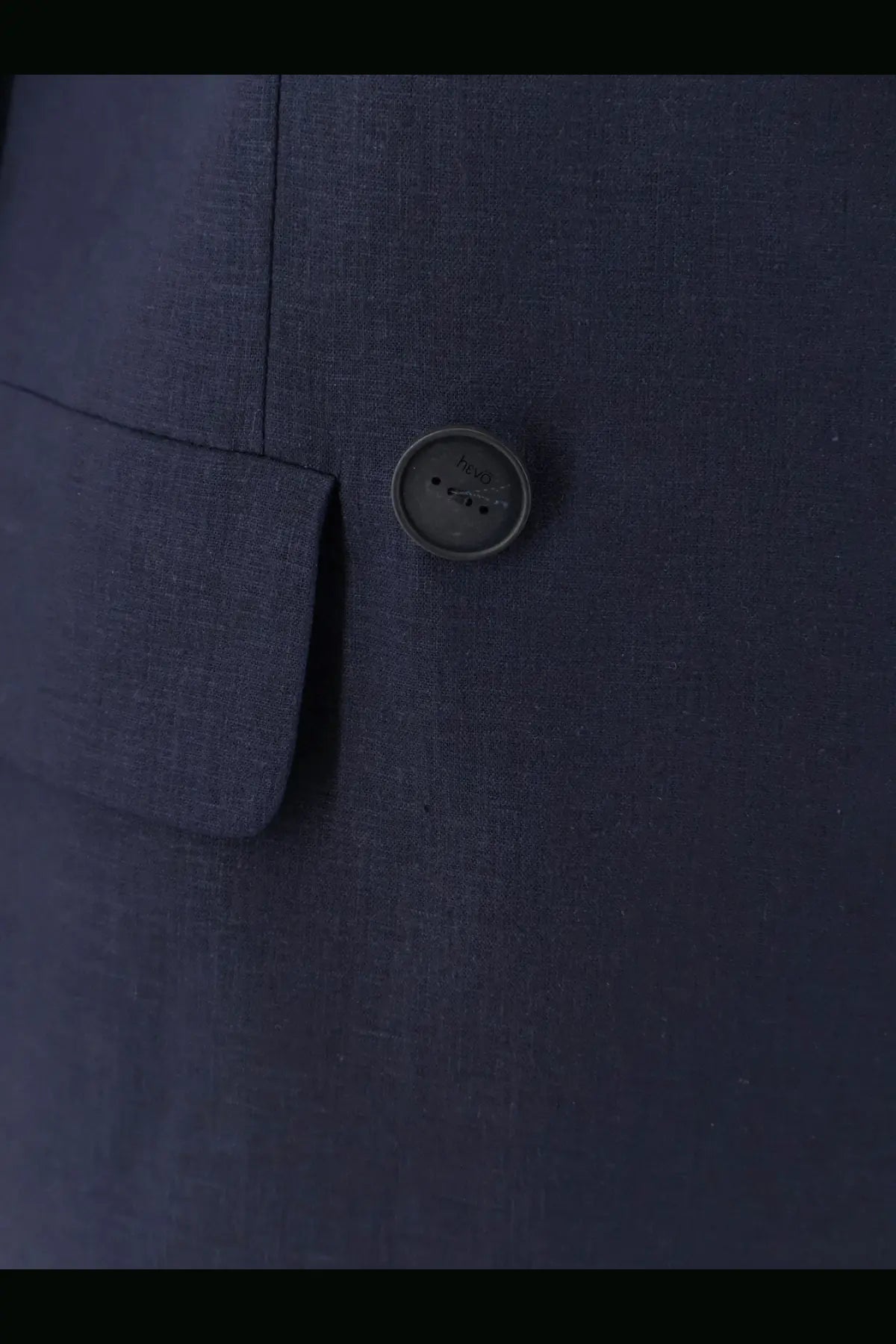 Dark blue linen and viscose suit jacket button with metallic finish and embossed hevò logo on womens rocchetta suit