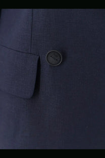 Dark blue linen and viscose suit jacket button with metallic finish and embossed hevò logo on womens rocchetta suit