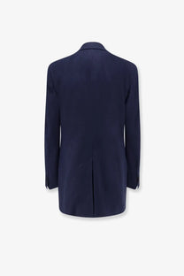 Navy blue tailored blazer with sleek structured silhouette and subtle seam detailing from hevò rocchetta linen and viscose suit