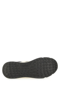 Black rubber sole with circular tread and hogan logo embossed in center of hogan men’s hyperlight sneaker blue