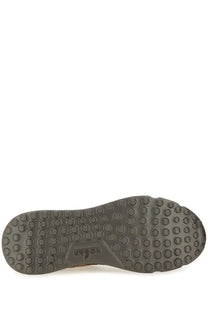 Dark olive rubber sole with circular tread and embossed hogan logo on hogan men’s hyperlight sneaker brown