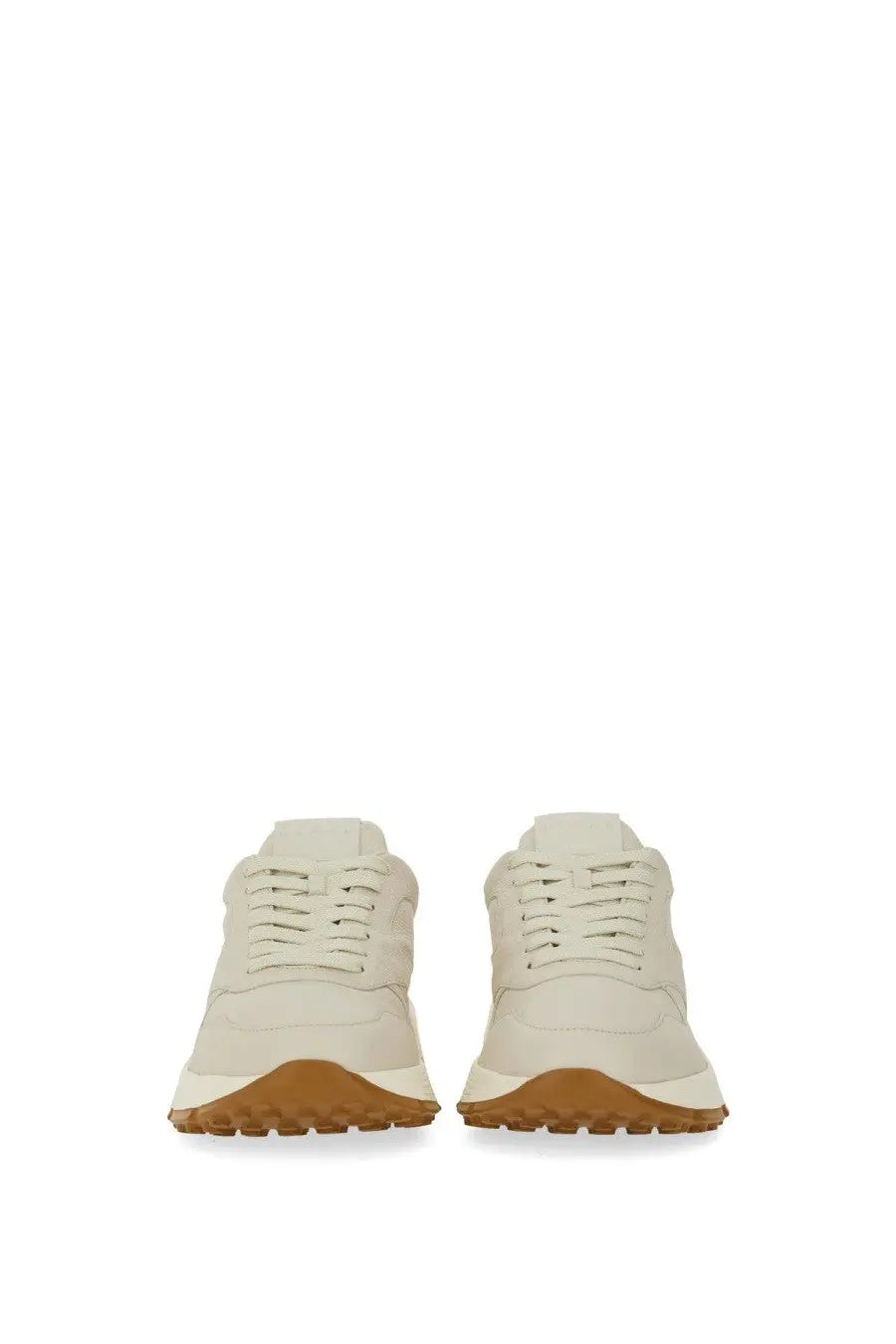 Cream-colored leather hogan men’s hyperlight sneaker with tan rubber sole and classic lace-up design