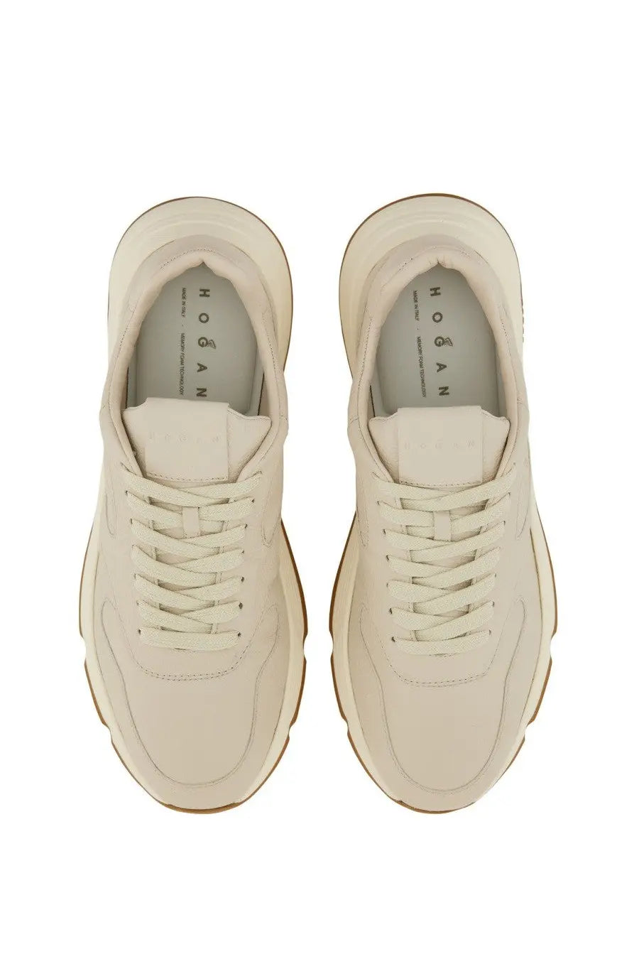 Cream-colored hogan men’s hyperlight sneakers with chunky sole and minimalist design in white leather