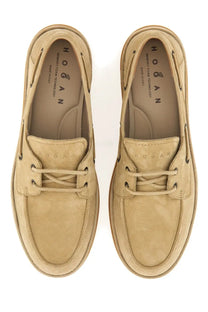 Beige suede Hogan men’s leather boat moccasin with classic lace-up design and embroidered logo on the tongue