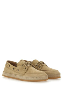 Hogan men’s beige leather boat moccasin in suede with woven rubber sole and matching laces