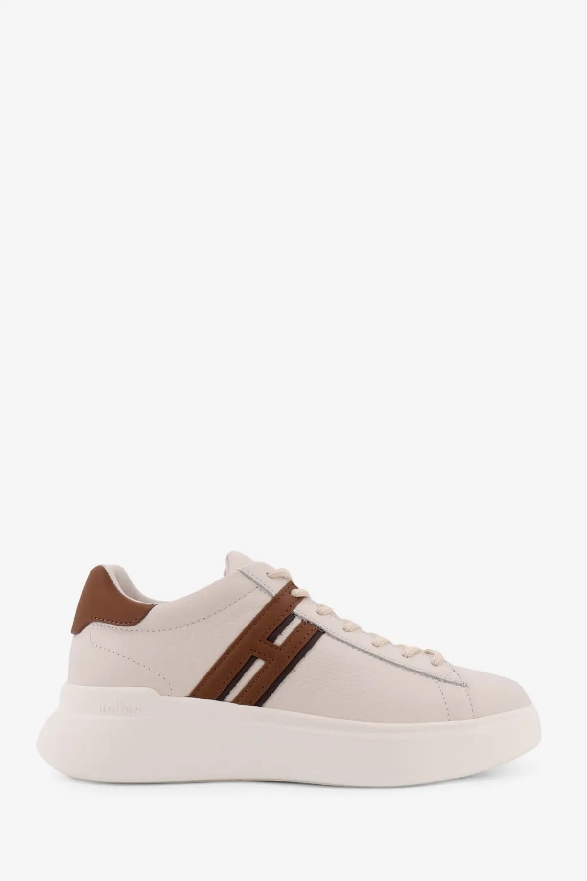 Cream-colored hush puppies sneaker with brown leather accents and chunky white sole for men by Hogan