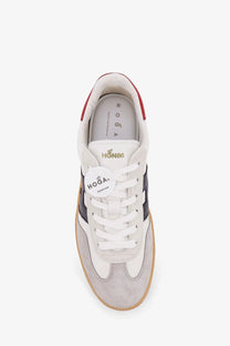 Hogan men’s leather sneakers in white with gray suede, black stripes, red heel tab, and tan rubber sole