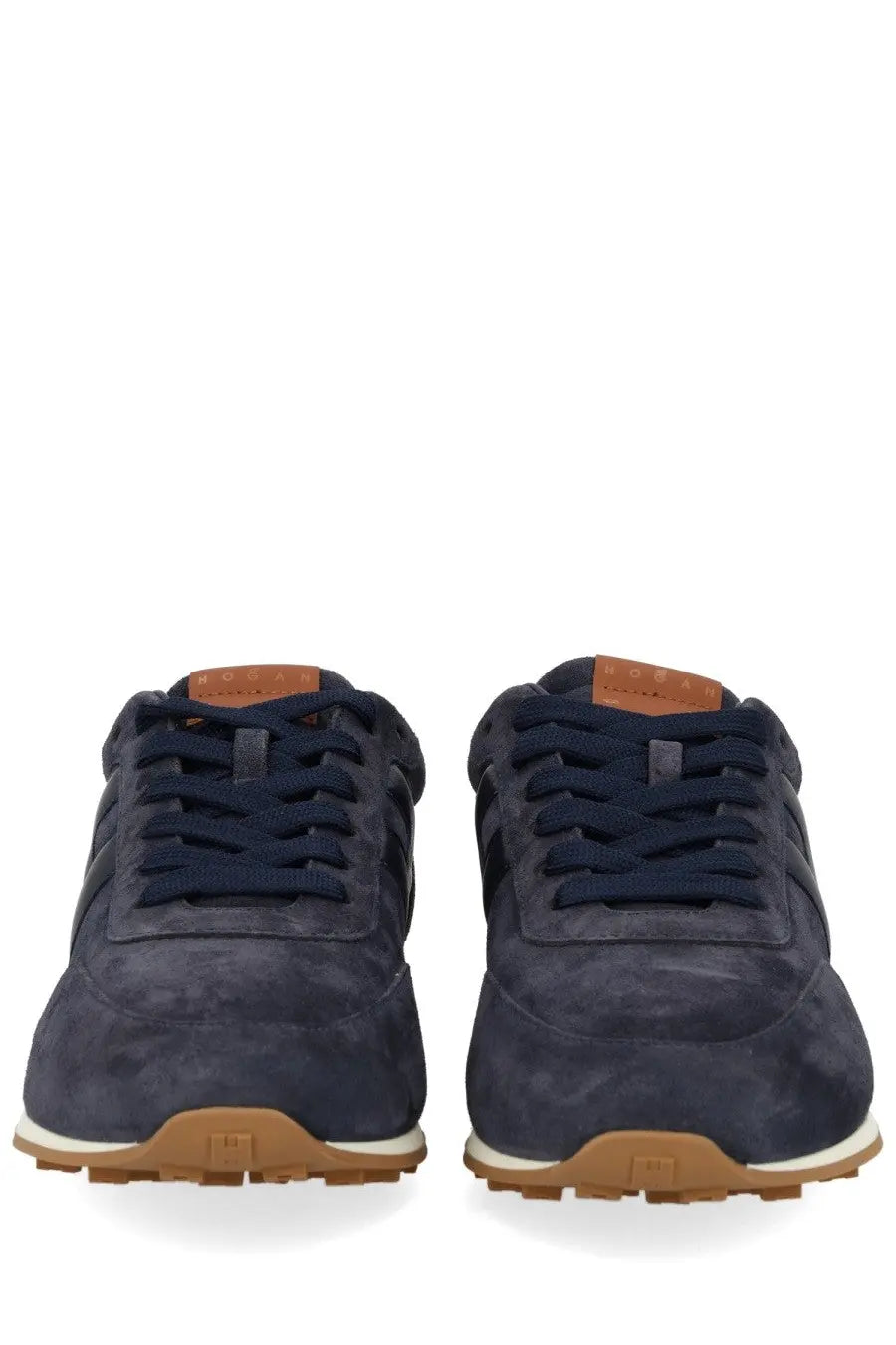 Hogan men’s sneaker athletic blue navy blue suede with tan rubber soles and matching laces in front view