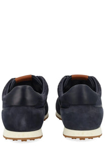 Hogan men’s sneaker athletic blue navy blue suede with tan leather heel tabs and white rubber soles shown from the back