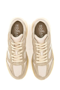 Hogan men’s sneaker beige featuring suede and mesh materials with white laces and perforated panels