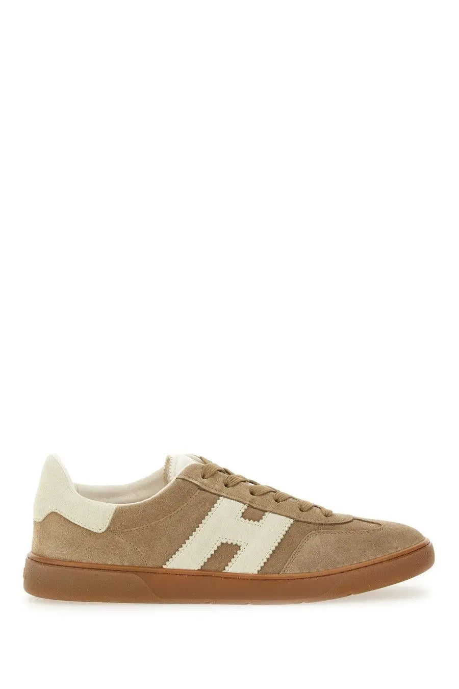 Tan suede low-top hogan men’s sneaker cool brown with cream h logo and gum rubber sole visible from the back side