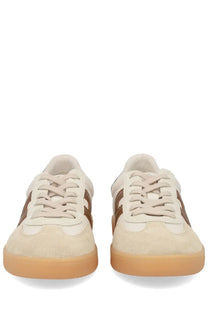Cream-colored suede hogan men’s sneaker with brown stripes and gum rubber sole for casual wear