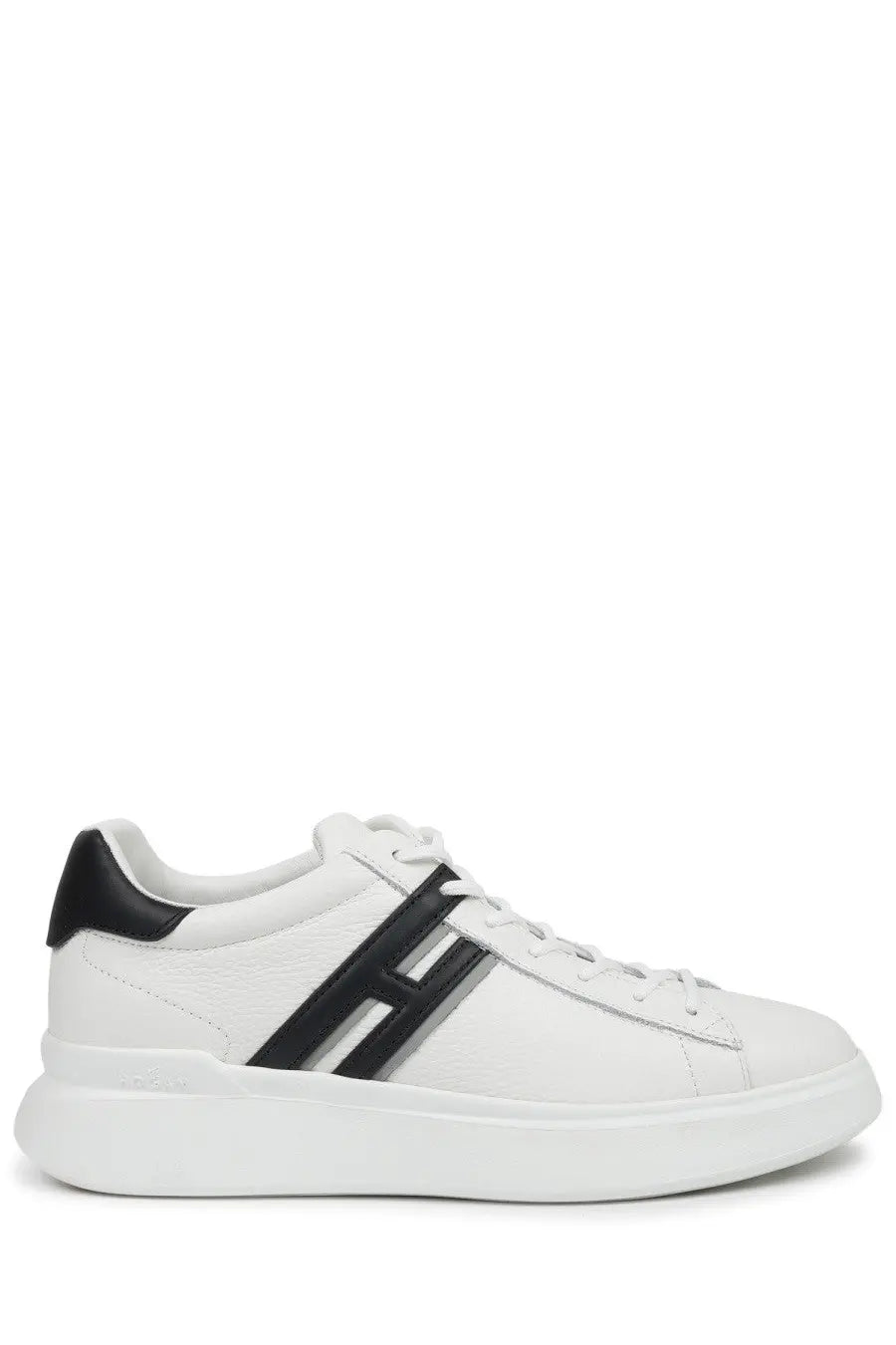 Hogan men’s sneaker h580 in white leather with black accents and bold h logo on the side