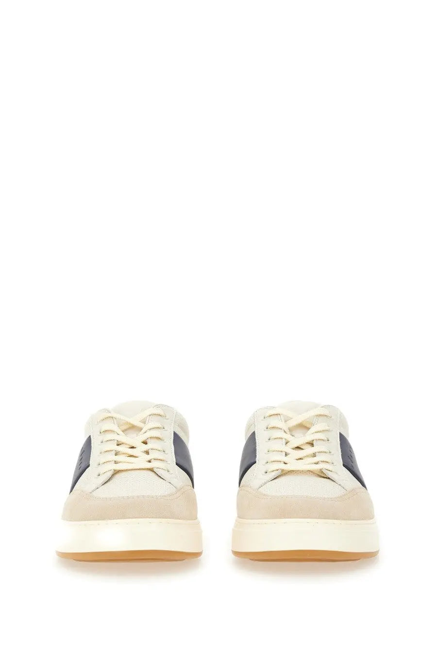 Cream-colored suede hogan men’s sneaker with dark gray side panels and white rubber sole for casual wear