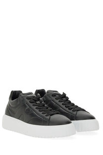 Hogan men’s sneaker stripes black leather sneakers with bold white rubber sole and subtle embossed branding on the side