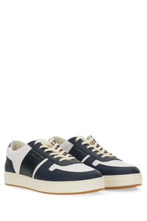 Navy and white leather low-top hogan tv sneaker for men with cream laces and chunky sole