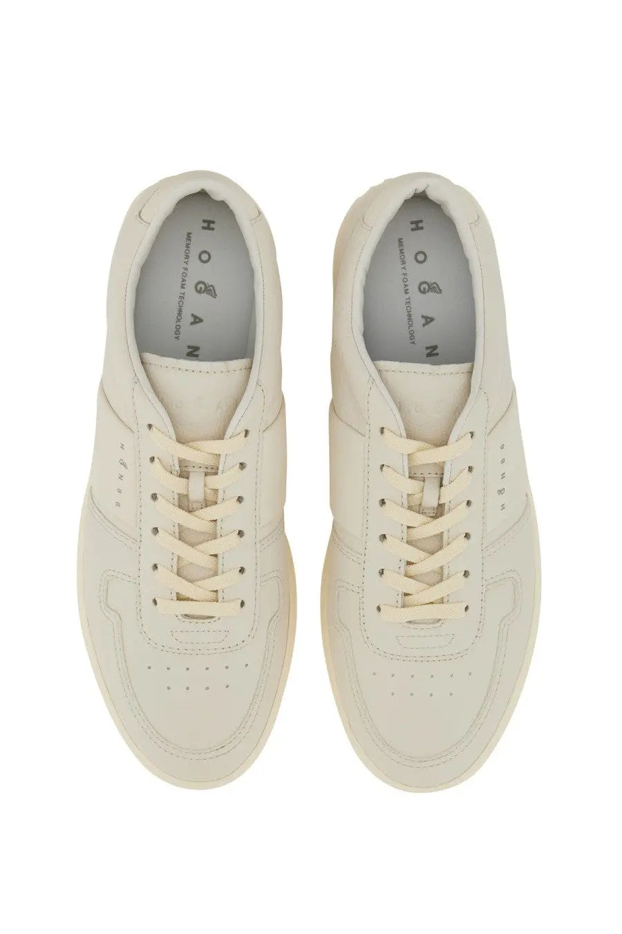 Cream-colored leather Hogan men’s Hogan TV sneaker with minimalist design and white laces