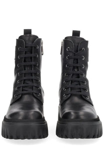 Hogan women’s boot H700 black leather combat boots with thick textured soles and laces through silver eyelets