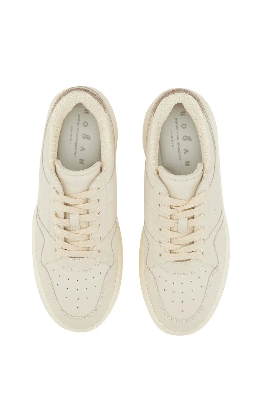 Cream-colored Hogan women’s leather sneakers with sleek minimalist design and subtle metallic heel accents back view
