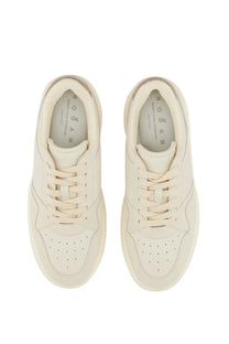Cream-colored Hogan women’s leather sneakers with sleek minimalist design and subtle metallic heel accents back view