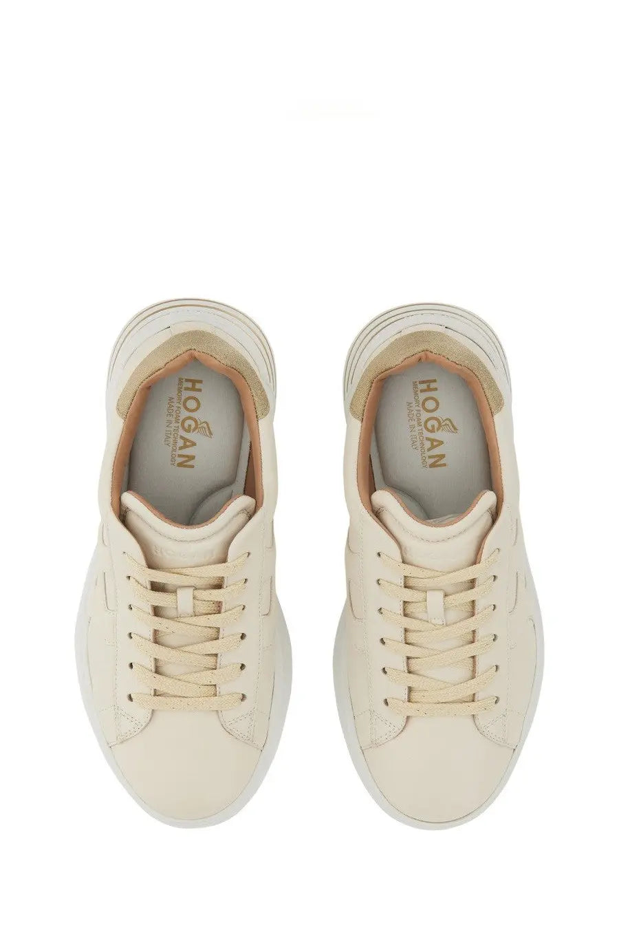Cream-colored hogan women’s rebel sneakers with sleek minimalist design and subtle tan inner lining accents