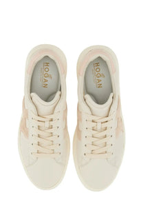 Hogan women’s rebel sneaker white cream-colored leather with subtle pink accents and sleek minimalist design