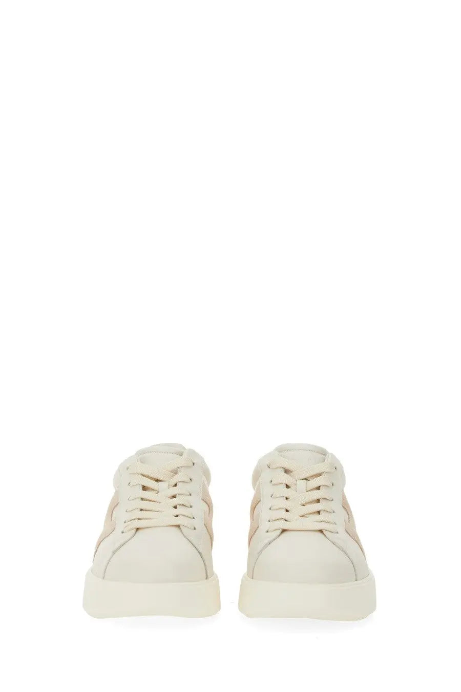 Cream-colored suede hogan women’s rebel sneakers with minimalist design and subtle beige side panels