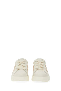Cream-colored suede hogan women’s rebel sneakers with minimalist design and subtle beige side panels