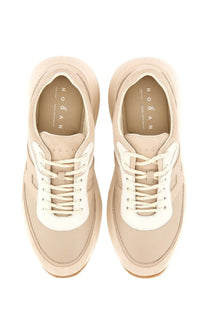 Hogan women’s sneaker H696 beige with white laces and sleek modern design in beige leather and fabric