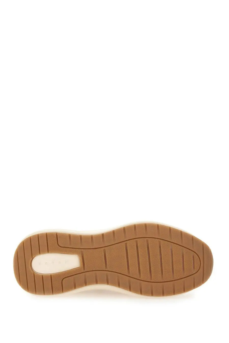 Tan rubber sole with white midsole and textured grip pattern on Hogan women’s sneaker H696 beige