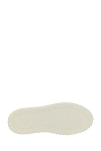 Off-white rubber sole with textured wavy edge on hogan women’s sneaker stripes beige