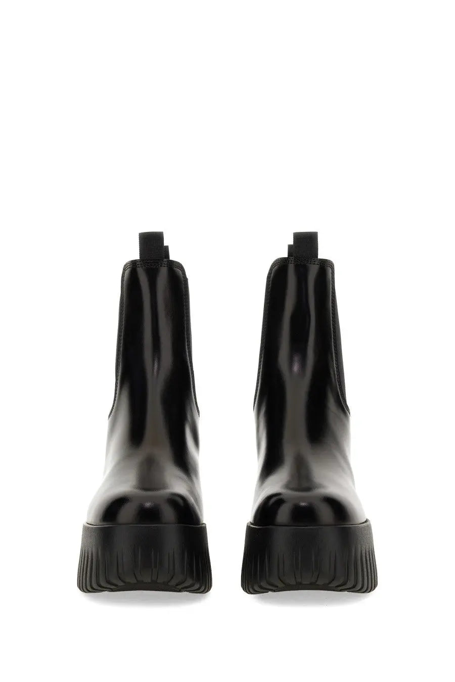 Hogan women’s stripe chelsea boot black with black patent leather and chunky textured rubber sole front view