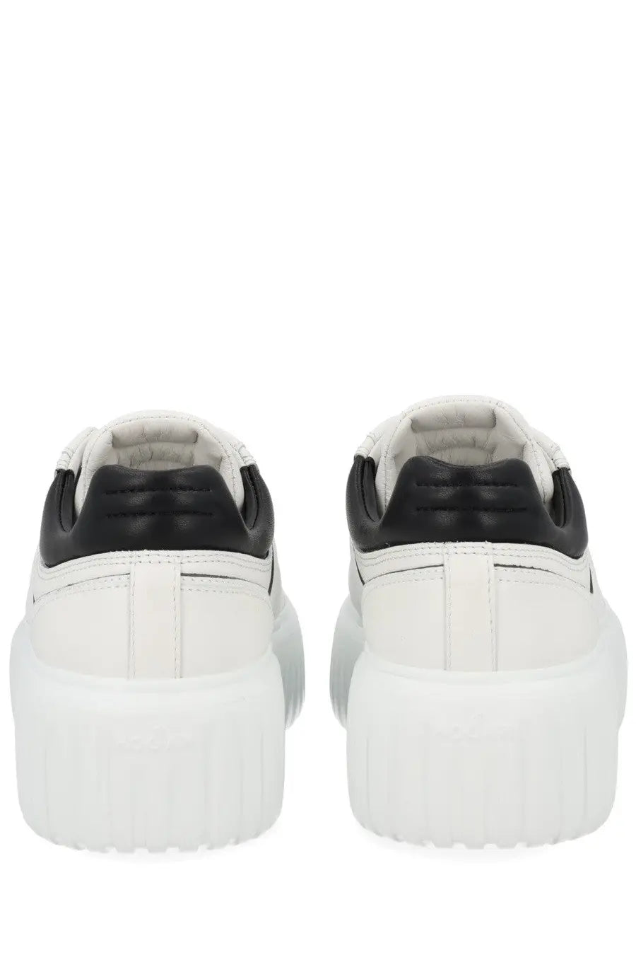 Hogan women’s stripes sneaker white platform sneaker with chunky sole and sleek leather upper in white and black
