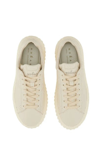 Hogan women’s stripes sneaker white featuring cream-colored minimalist design with textured rubber soles